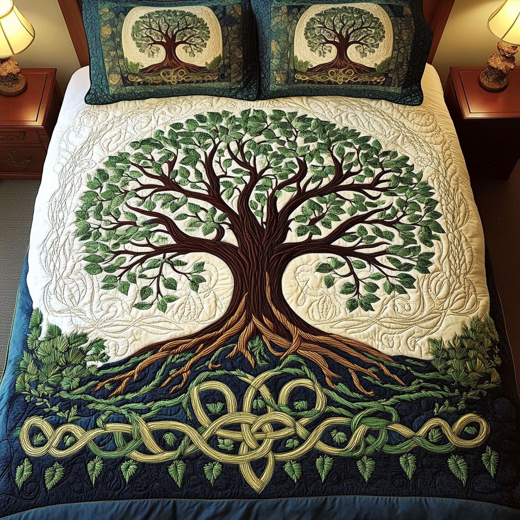Oak of Wisdom quilted 3-piece bedding set on a made bed with two matching pillow shams