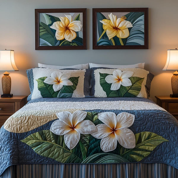 Ocean Bliss quilted 3-piece bedding set on a made bed in a light coastal bedroom