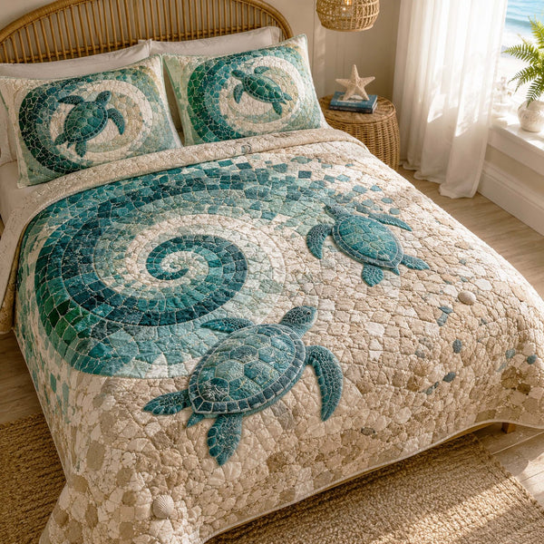 Ocean Escape quilted 3-piece bedding set on a made bed in a light coastal bedroom
