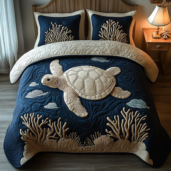 Ocean Harmony quilted 3-piece bedding set on a made bed in a light coastal bedroom