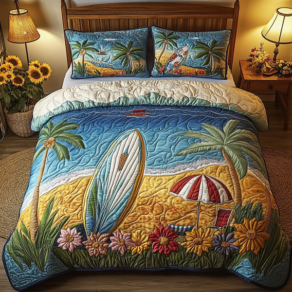 Ocean Ride quilted 3-piece bedding set on a made bed in a light coastal bedroom
