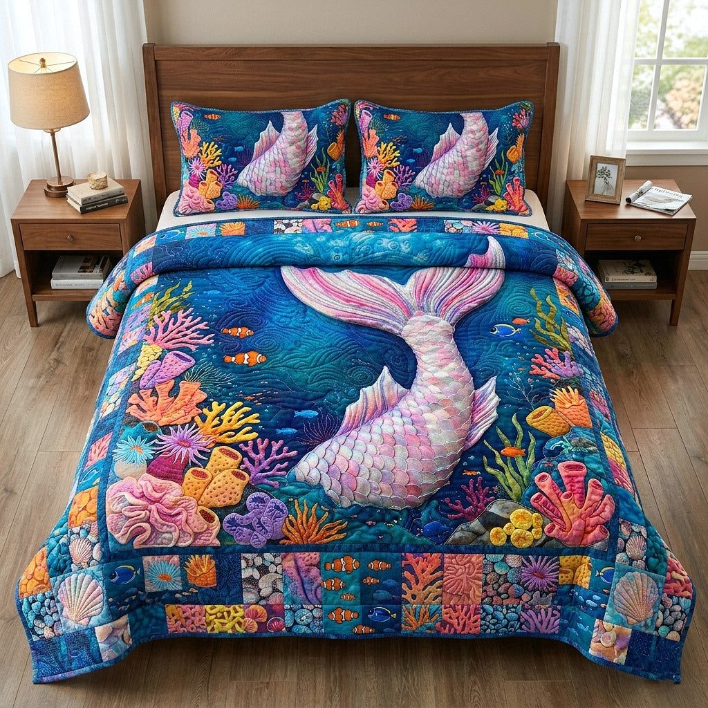 Ocean Siren quilted 3-piece bedding set on a made bed in a light coastal bedroom