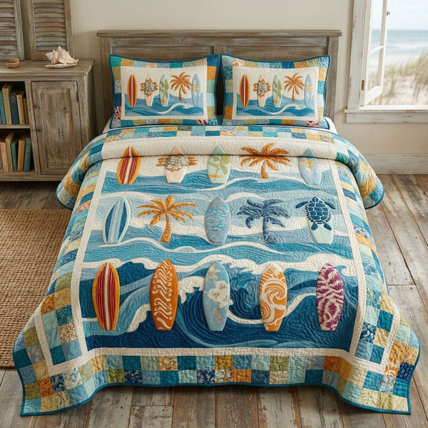 Ocean Spray quilted 3-piece bedding set on a made bed in a light coastal bedroom