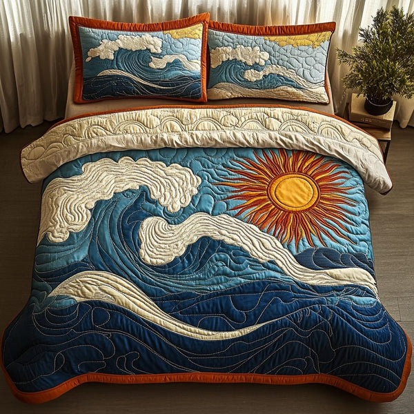 Ocean Sunrise quilted 3-piece bedding set on a made bed in a light coastal bedroom