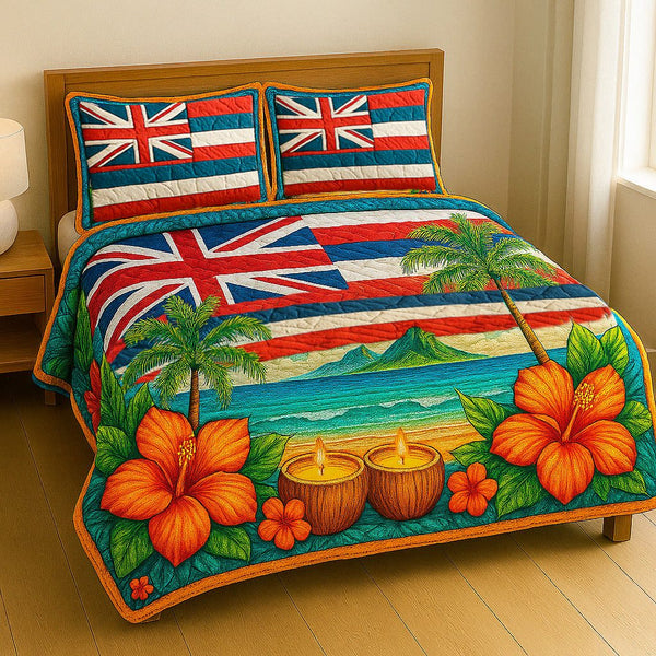 Ocean Sunset quilted 3-piece bedding set on a made bed in a light coastal bedroom