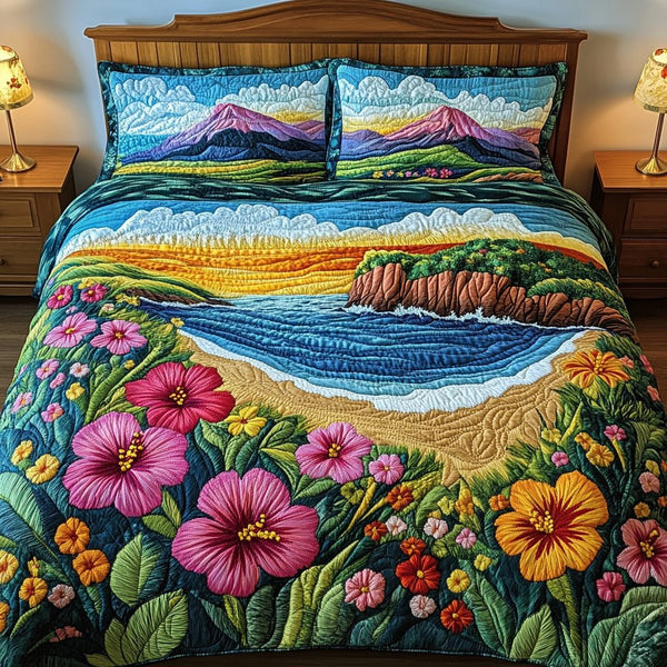 Ocean Vibes quilted 3-piece bedding set on a made bed in a light coastal bedroom