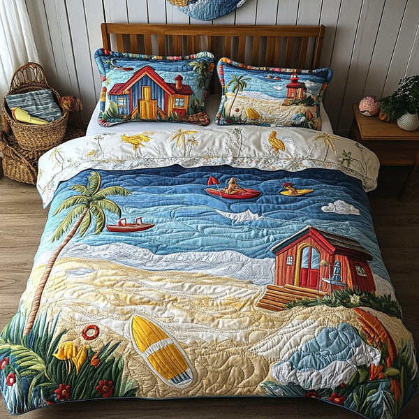 Ocean View quilted 3-piece bedding set on a made bed in a light coastal bedroom
