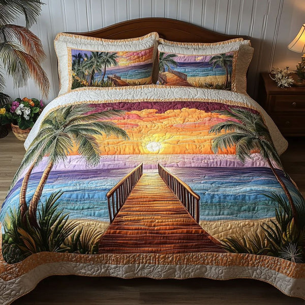 Ocean Walk Serenity quilted 3-piece bedding set on a made bed in a light coastal bedroom