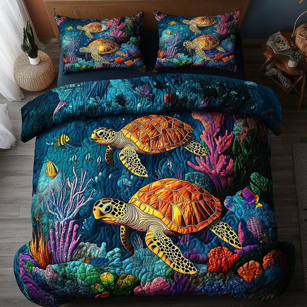 Ocean Wanderer quilted 3-piece bedding set on a made bed in a light coastal bedroom