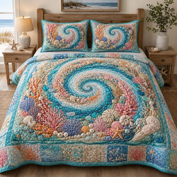 Ocean Whisper quilted 3-piece bedding set on a made bed in a light coastal bedroom