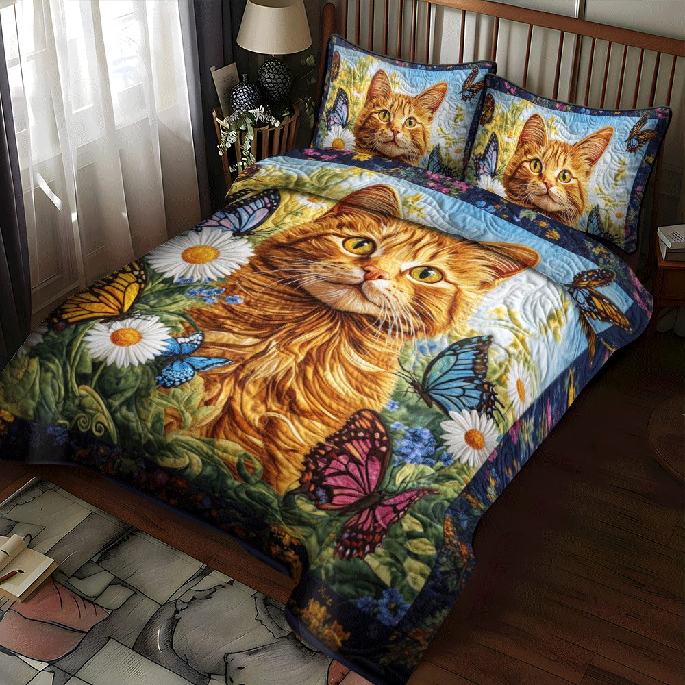 Orange Cat With Butterflies quilted 3-piece bedding set on a made bed with two matching pillow shams