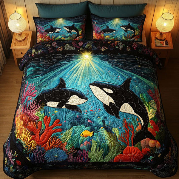 Orca Horizon quilted 3-piece bedding set on a made bed with two matching pillow shams