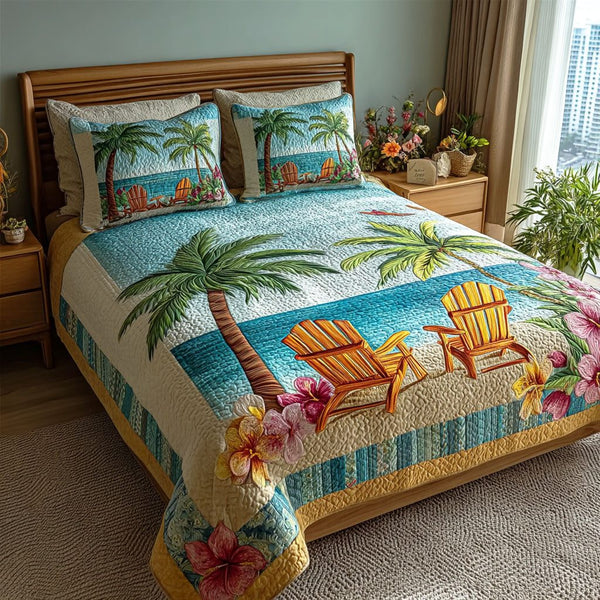 Palm Escape quilted 3-piece bedding set on a made bed in a light coastal bedroom