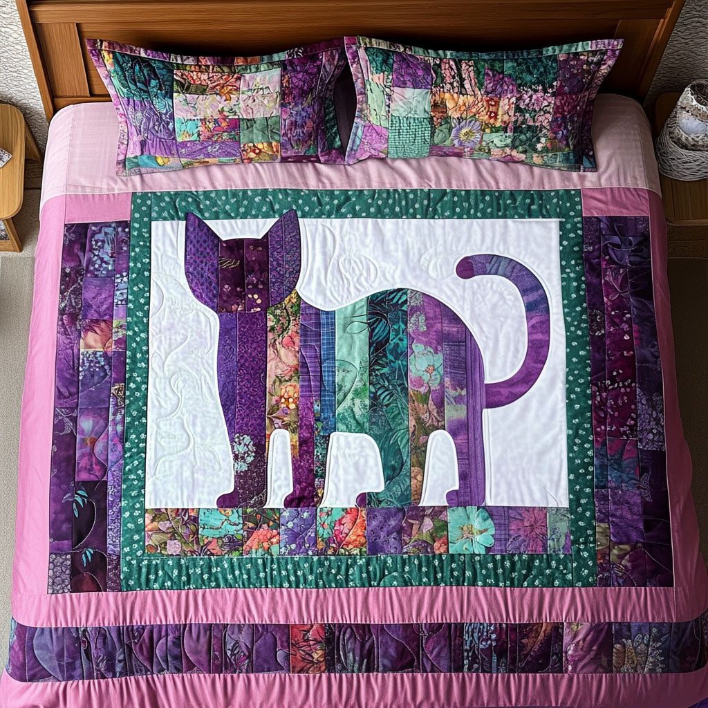 Pastel Cat Mosaic quilted 3-piece bedding set on a made bed with two matching pillow shams