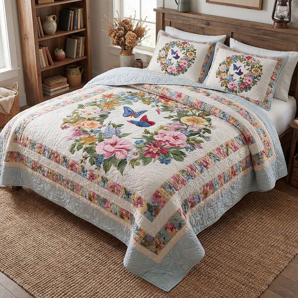 Pastel Garden Dream quilted 3-piece bedding set on a made bed with two matching pillow shams