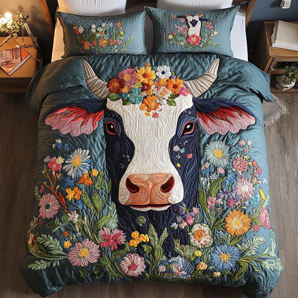 Pastoral Beauty quilted 3-piece bedding set on a made bed with two matching pillow shams