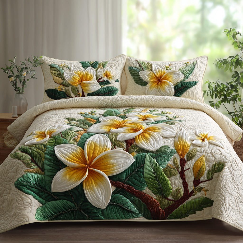 Pearl Lei quilted 3-piece bedding set on a made bed with two matching pillow shams