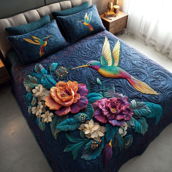 Peony Flight quilted 3-piece bedding set on a made bed with two matching pillow shams