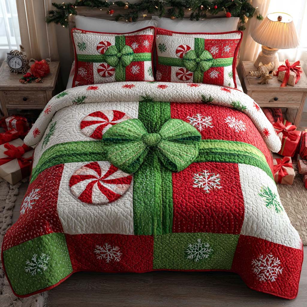 Peppermint Gift Glow quilted 3-piece bedding set on a made bed with two matching pillow shams