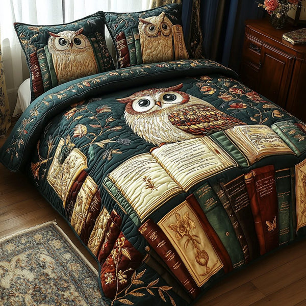 Perched Wisdom quilted 3-piece bedding set on a made bed with two matching pillow shams