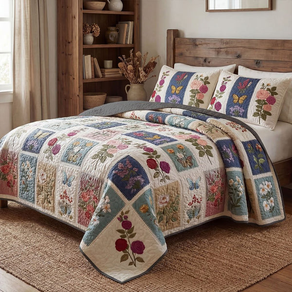 Petal Garden Retreat quilted 3-piece bedding set on a made bed with two matching pillow shams