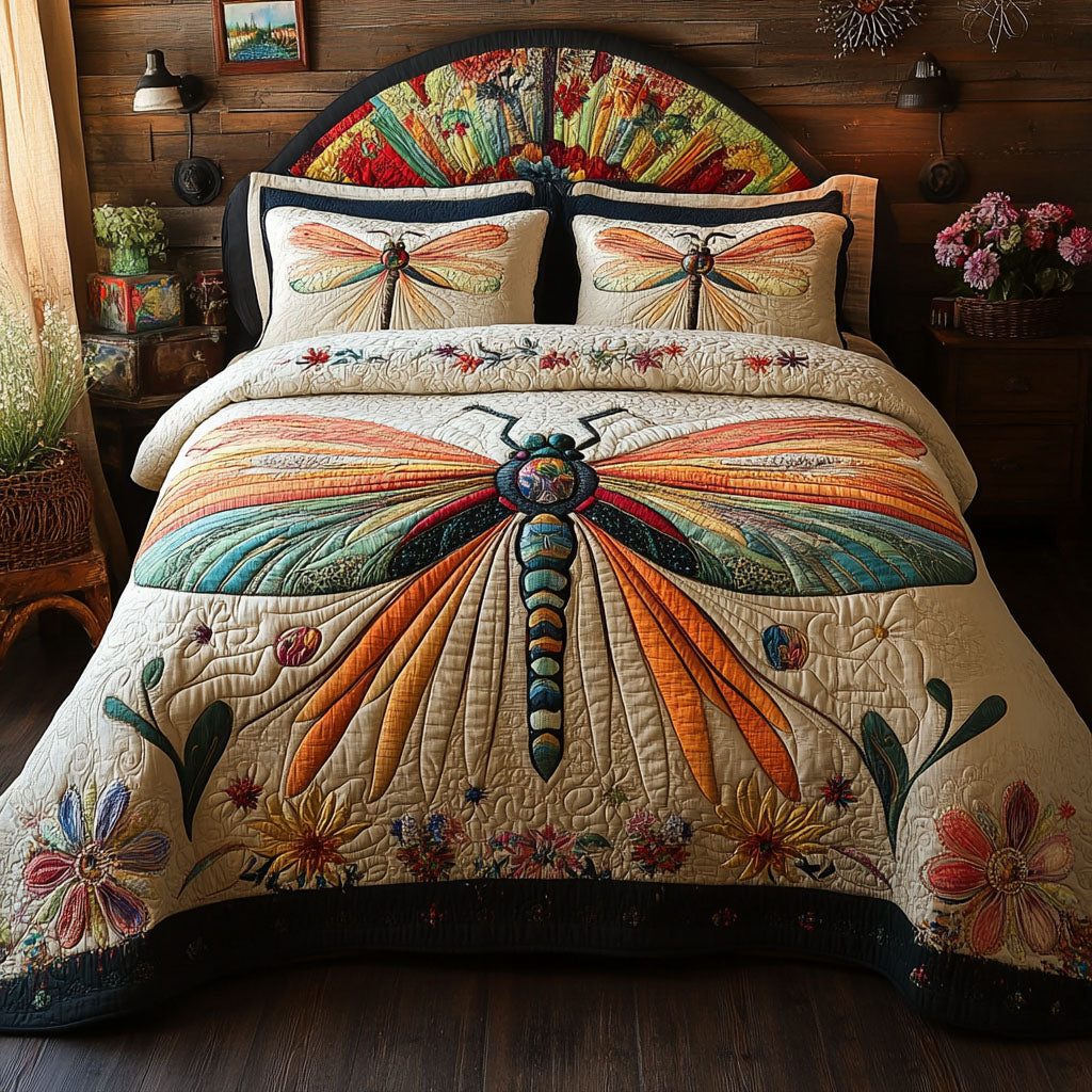 Petal Glide Elegance quilted 3-piece bedding set on a made bed with two matching pillow shams