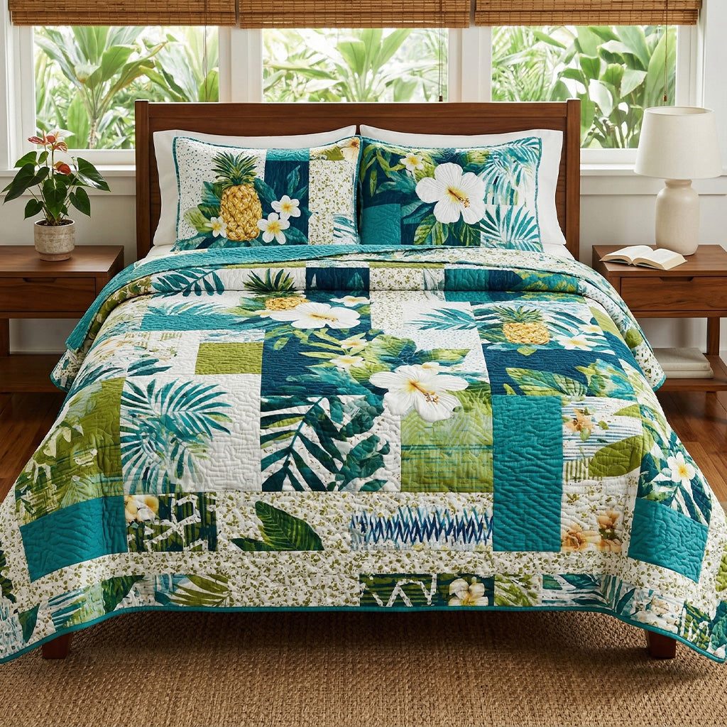 Pineapple Isle quilted 3-piece bedding set on a made bed with two matching pillow shams