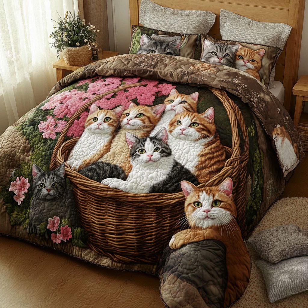 Playful Kittens quilted 3-piece bedding set on a made bed with two matching pillow shams
