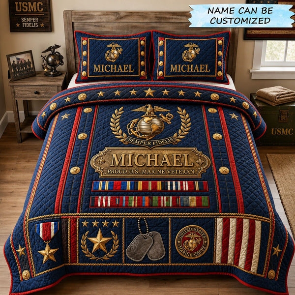 Proud Marine Service Legacy quilted 3-piece bedding set on a made bed in a warmly lit bedroom