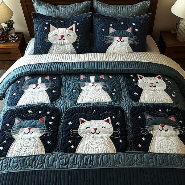 Purrfect Night Sky quilted 3-piece bedding set on a made bed with two matching pillow shams
