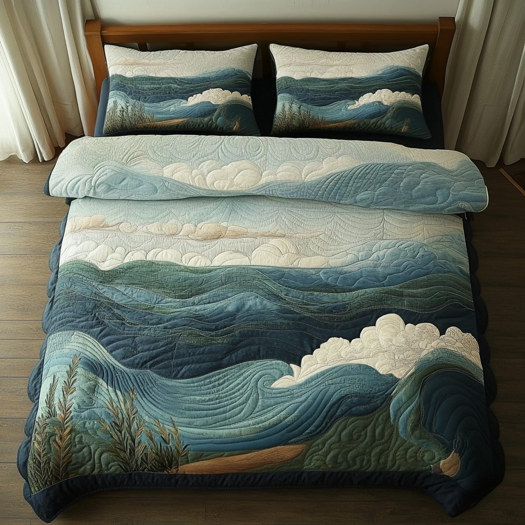 Quiet Tides quilted 3-piece bedding set on a made bed with two matching pillow shams
