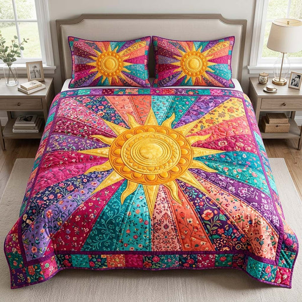 Radiant Bloom quilted 3-piece bedding set on a made bed with two matching pillow shams