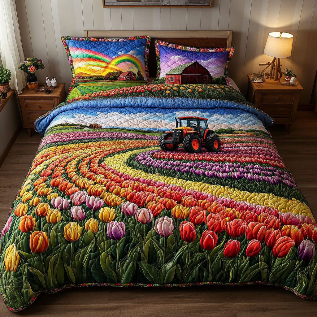 Rainbow Bloom Ride quilted 3-piece bedding set on a made bed with two matching pillow shams