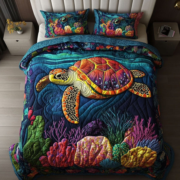 Reef Roamer quilted 3-piece bedding set on a made bed in a light coastal bedroom