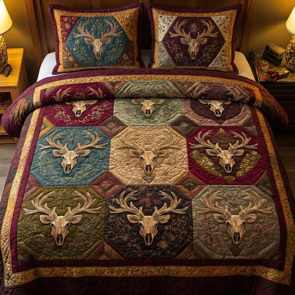 Regal Antlers quilted 3-piece bedding set on a made bed with two matching pillow shams