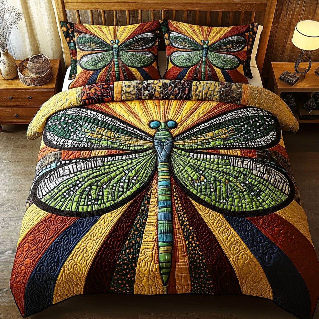Resilient Grace quilted 3-piece bedding set on a made bed with two matching pillow shams