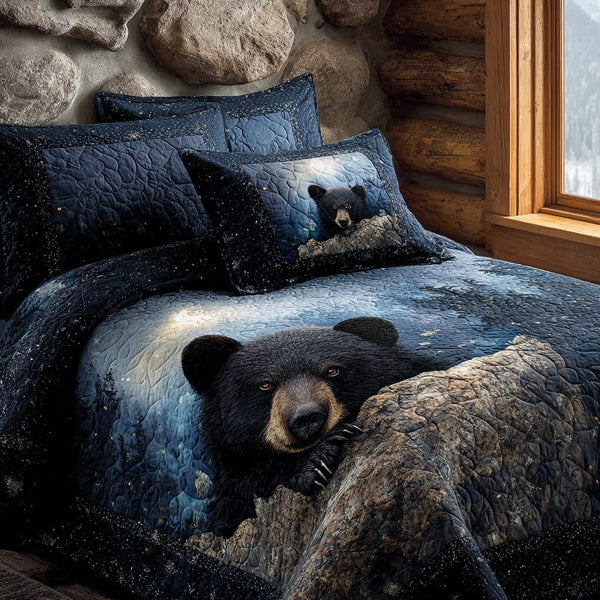 Roaming Black Bear quilted 3-piece bedding set on a made bed with two matching pillow shams