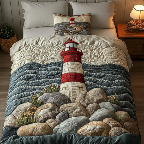 Rocky Shores Glow quilted 3-piece bedding set on a made bed in a light coastal bedroom