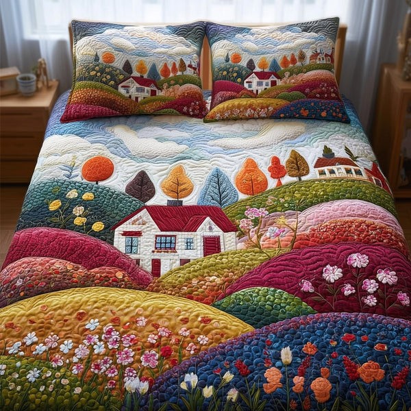 Rolling Heaven quilted 3-piece bedding set on a made bed in a softly lit bedroom