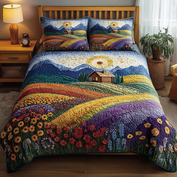 Rolling Heaven quilted 3-piece bedding set on a made bed in a softly lit bedroom