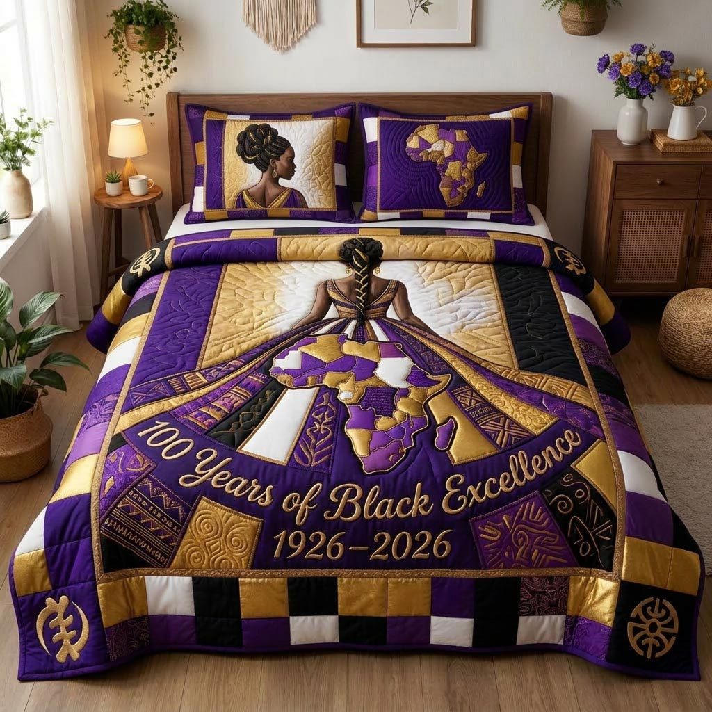 Royal Glow quilted 3-piece bedding set on a made bed with two matching pillow shams