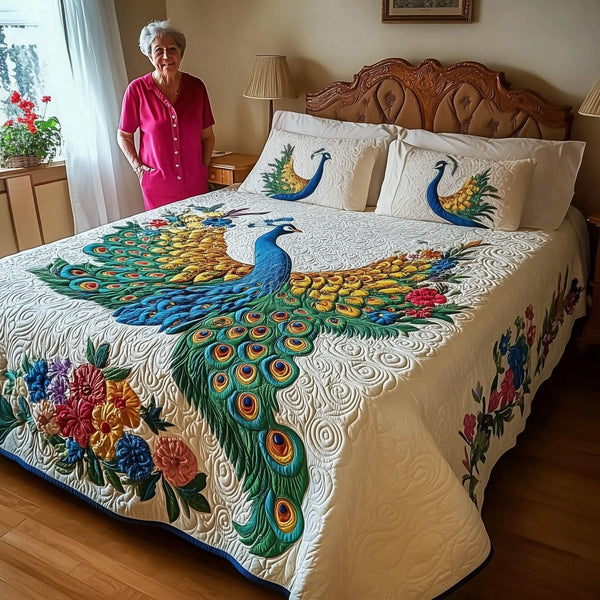 Royal Peacock quilted 3-piece bedding set on a made bed with two matching pillow shams