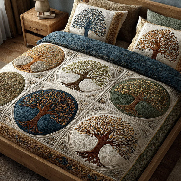 Sacred Tree quilted 3-piece bedding set on a made bed in a softly lit bedroom