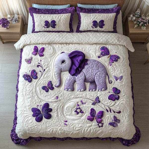 Safari Elephant Beauty quilted 3-piece bedding set on a made bed with two matching pillow shams
