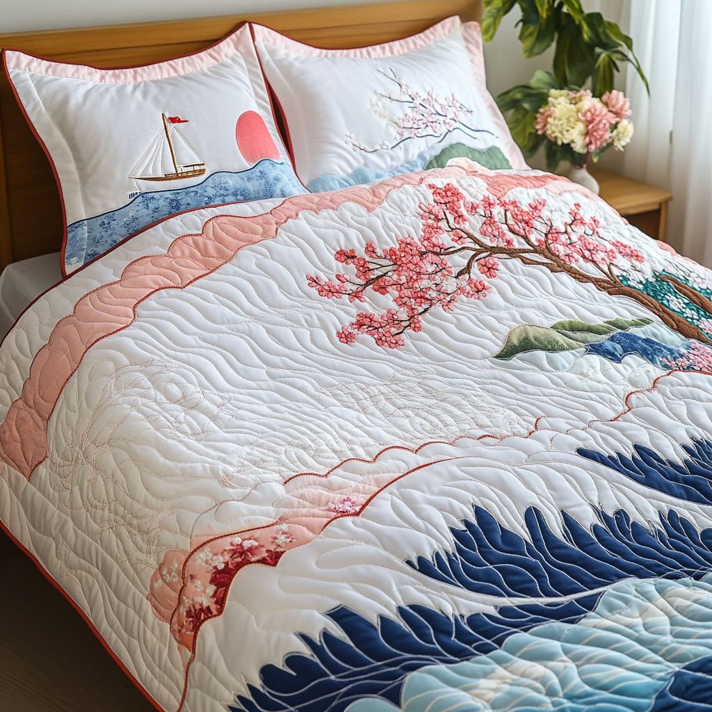 Sakura Waves quilted 3-piece bedding set on a made bed in a light coastal bedroom