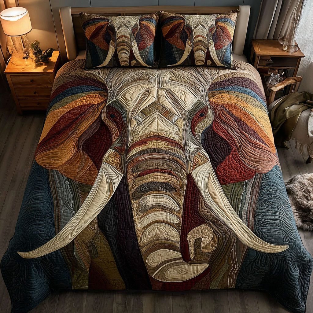 Savanna Sunset quilted 3-piece bedding set on a made bed with two matching pillow shams
