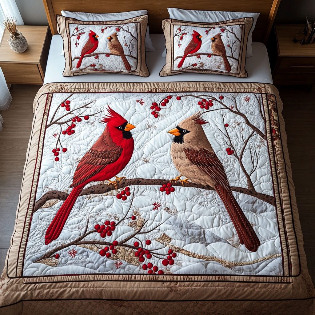 Scarlet Dreams quilted 3-piece bedding set on a made bed with two matching pillow shams