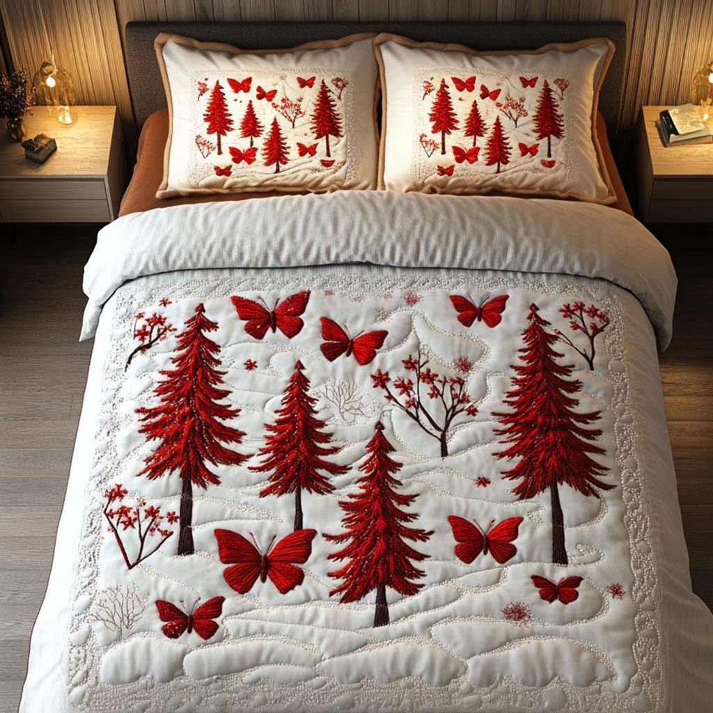 Scarlet Pines quilted 3-piece bedding set on a made bed with two matching pillow shams
