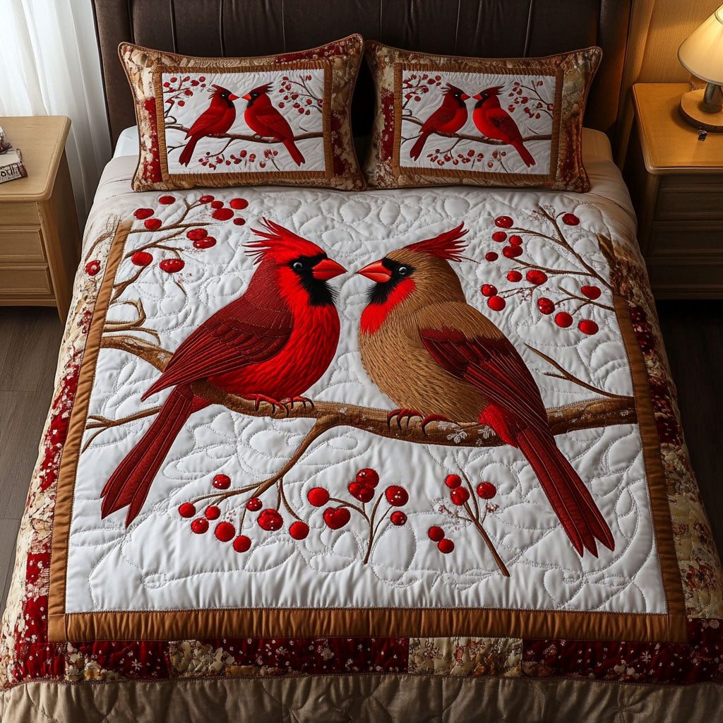 Scarlet Romance quilted 3-piece bedding set on a made bed with two matching pillow shams