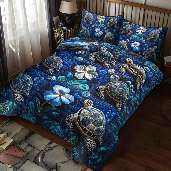 Sea Breeze Glide quilted 3-piece bedding set on a made bed in a light coastal bedroom
